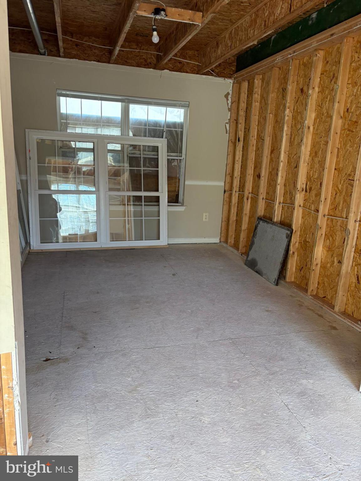 9310 Biemans Terrace Bowie, MD 20721 - Photo 17 of 40 a view of an empty room with a window