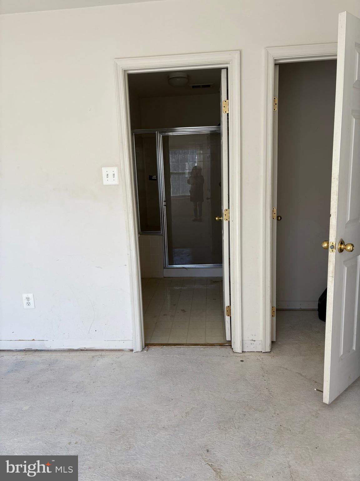 9310 Biemans Terrace Bowie, MD 20721 - Photo 22 of 40 a view of an empty room with a hallway