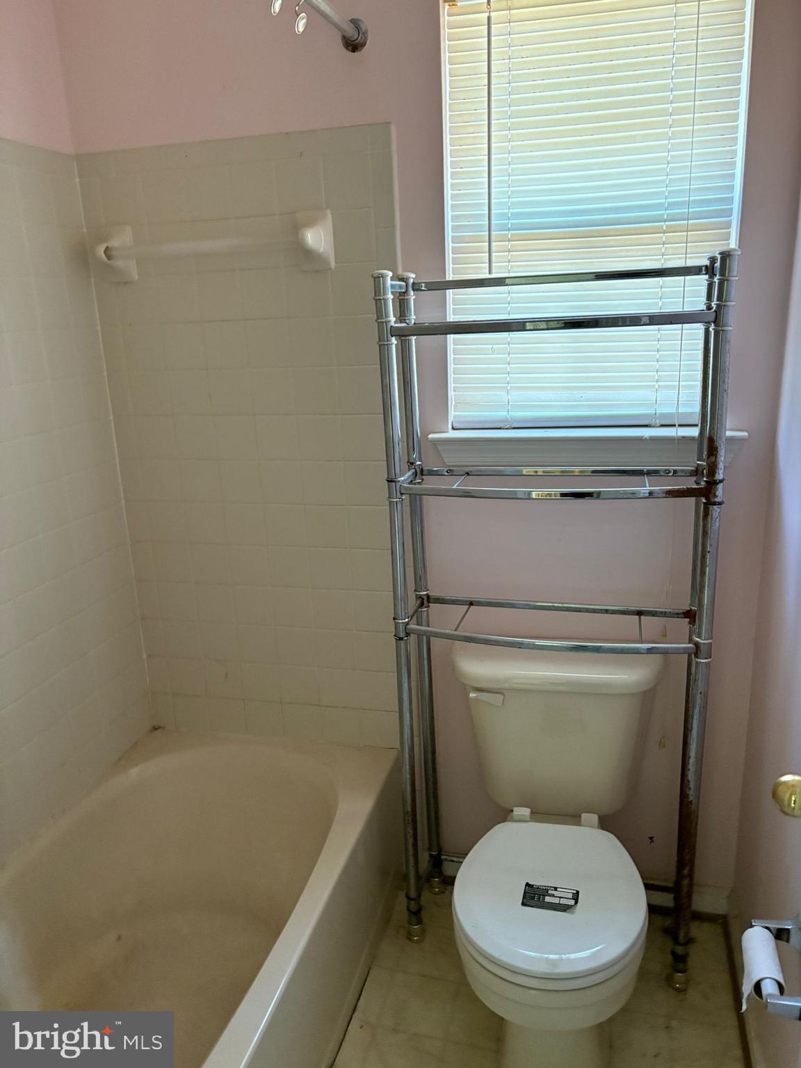 9310 Biemans Terrace Bowie, MD 20721 - Photo 32 of 40 a bathroom with a toilet and a bathtub