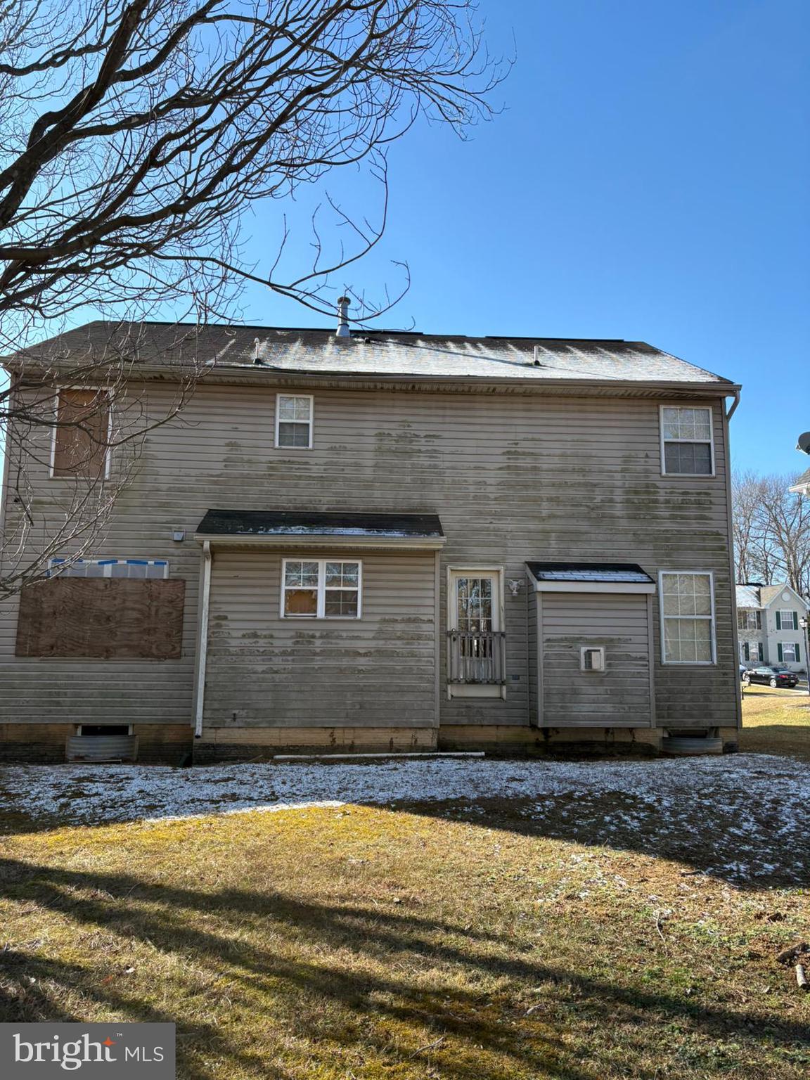 9310 Biemans Terrace Bowie, MD 20721 - Photo 7 of 40 a front view of a house with a yard