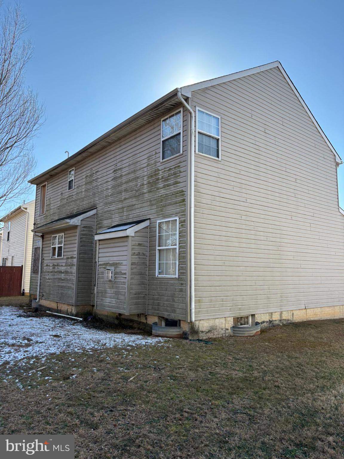 9310 Biemans Terrace Bowie, MD 20721 - Photo 8 of 40 a front view of a house with a yard
