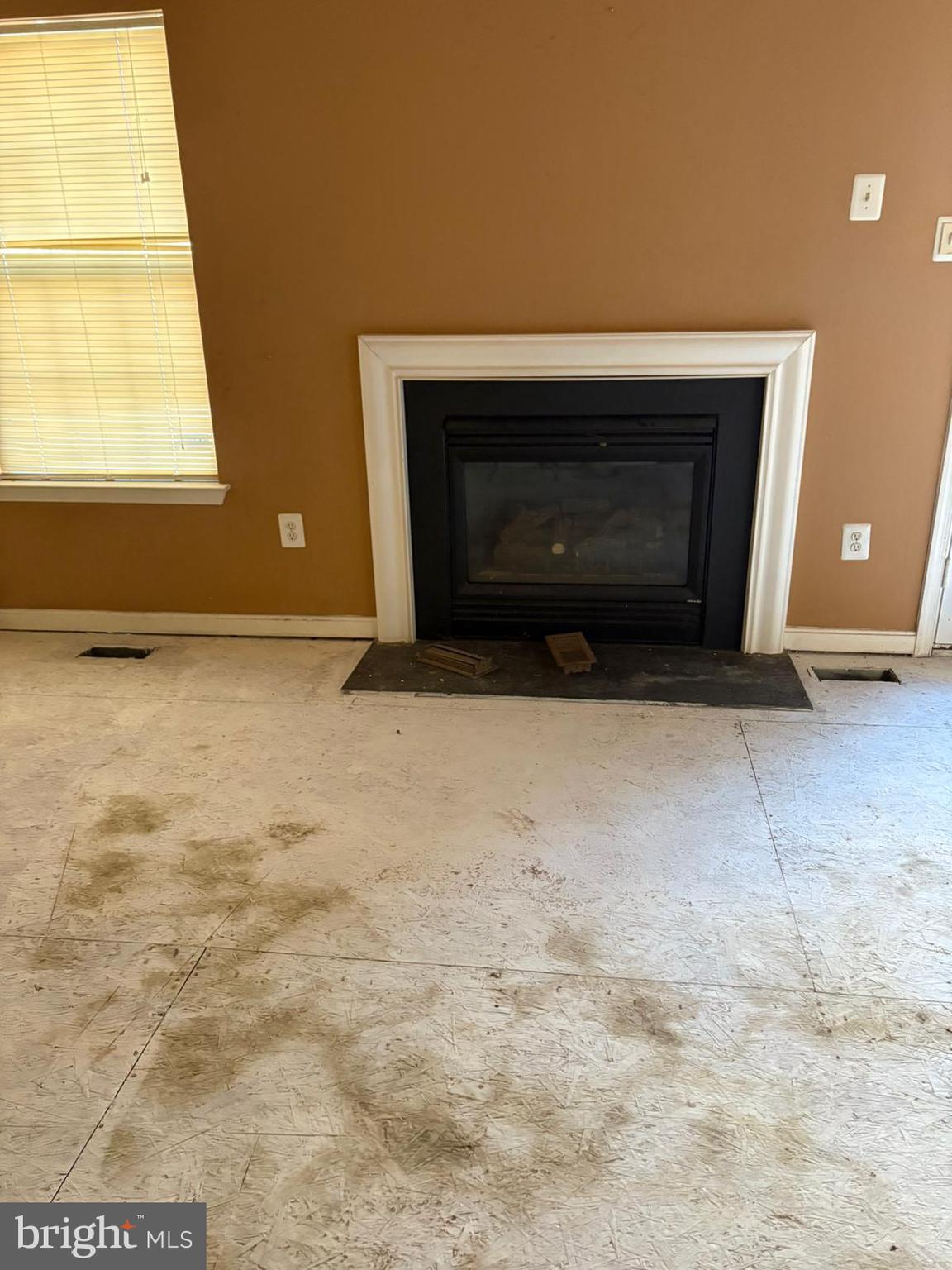 9310 Biemans Terrace Bowie, MD 20721 - Photo 10 of 40 a view of empty room with a fireplace