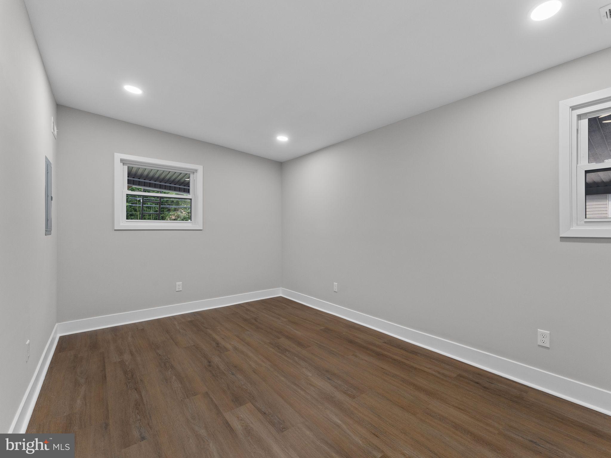 9314 Trout Road Philadelphia, PA 19115 - Photo 13 of 23 a view of room with wooden floor and window