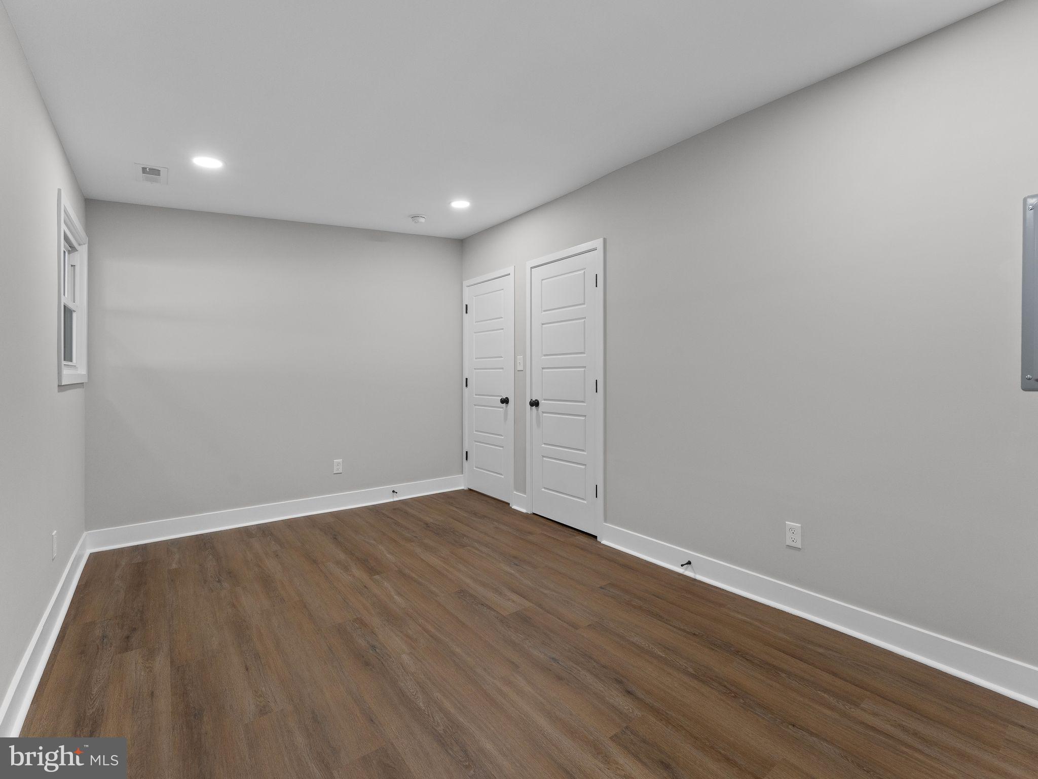 9314 Trout Road Philadelphia, PA 19115 - Photo 14 of 23 a view of an empty room with wooden floor