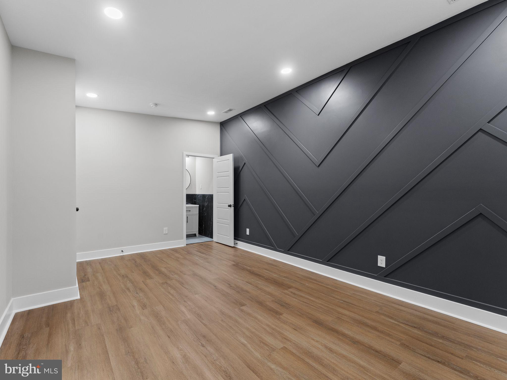 9314 Trout Road Philadelphia, PA 19115 - Photo 17 of 23 a view of a livingroom with a ceiling fan and wooden floor
