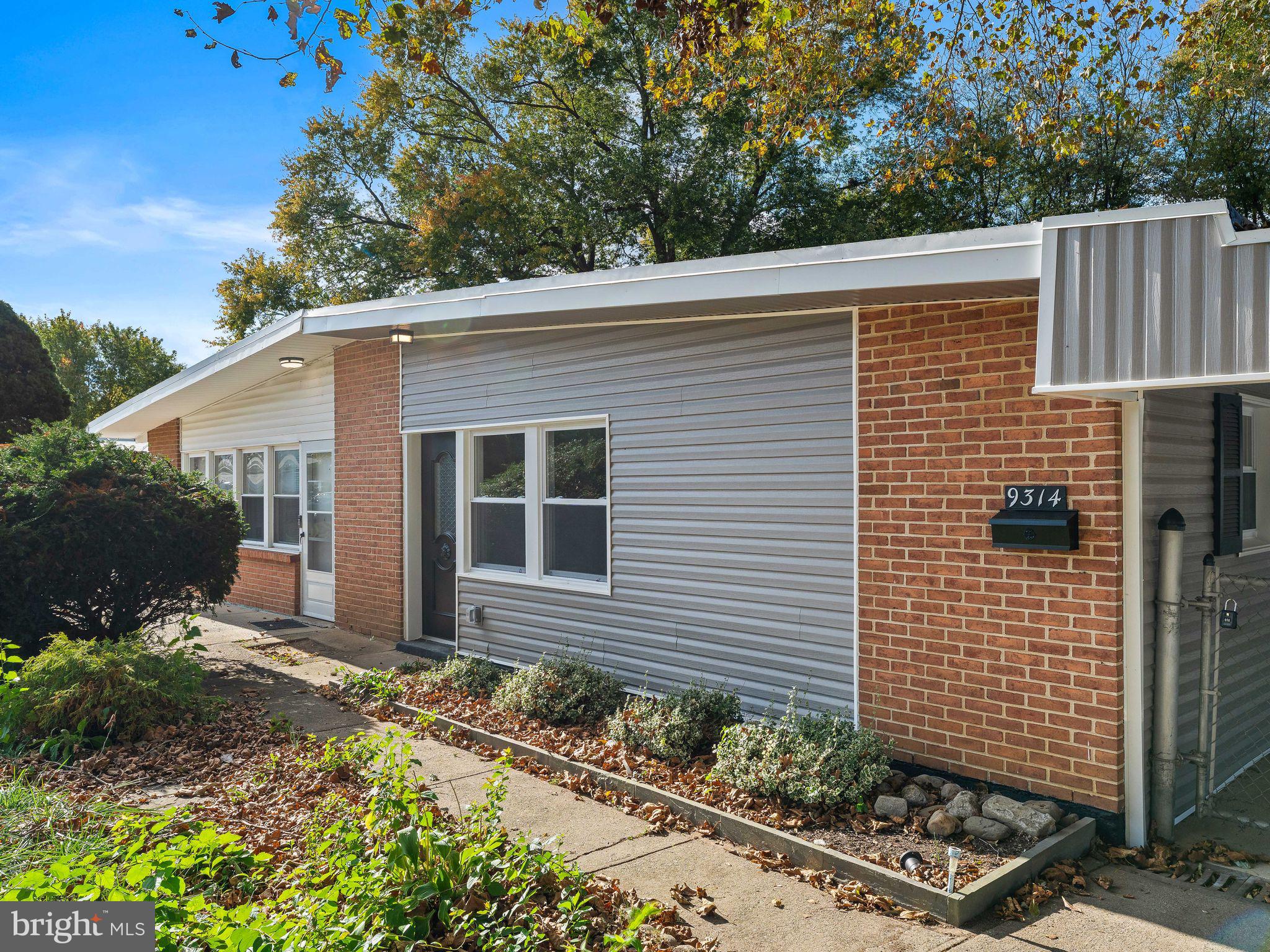 9314 Trout Road Philadelphia, PA 19115 - Photo 20 of 23 a front view of a house with garden
