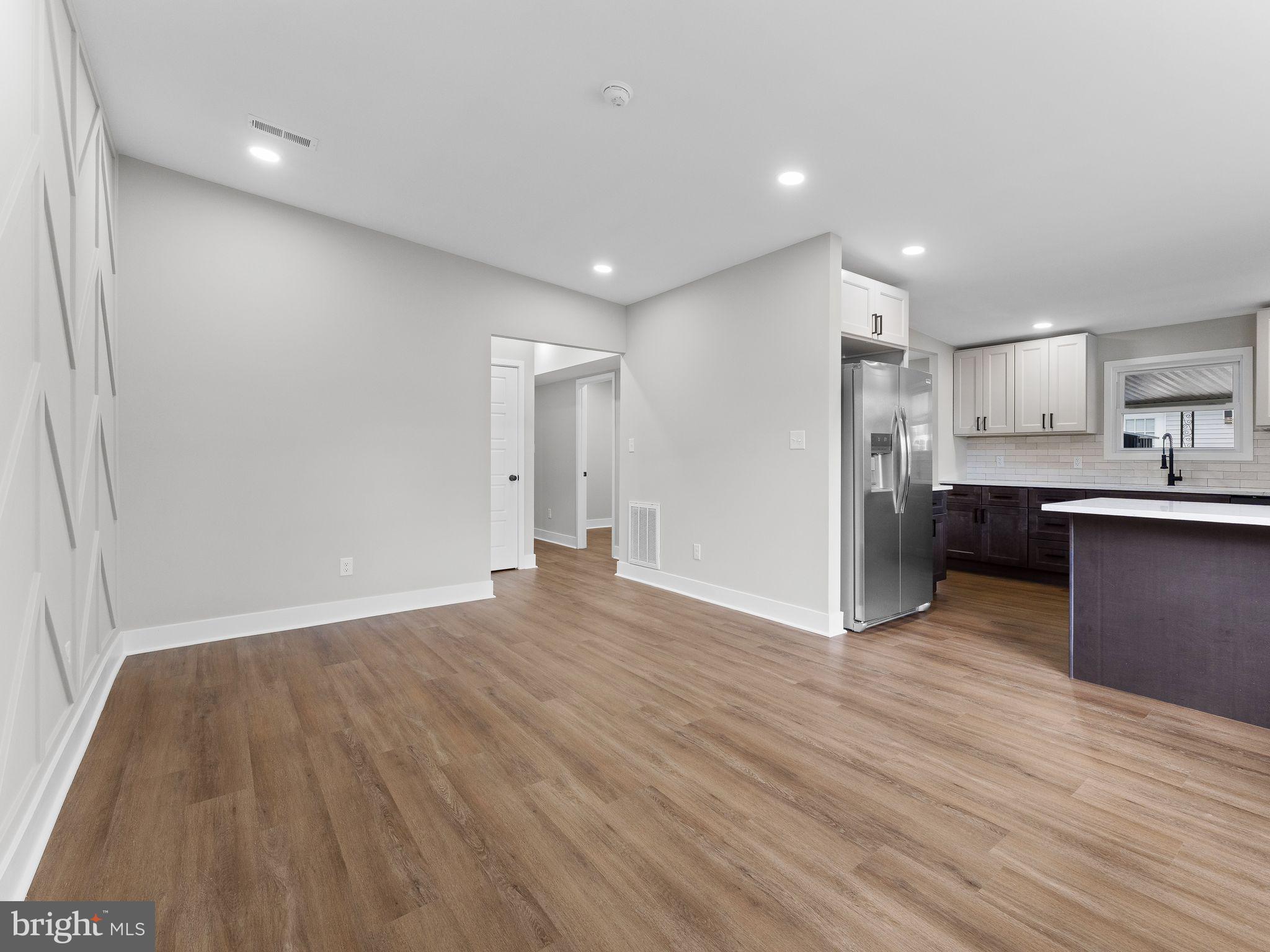 9314 Trout Road Philadelphia, PA 19115 - Photo 7 of 23 a view of kitchen with wooden floor and electronic appliances
