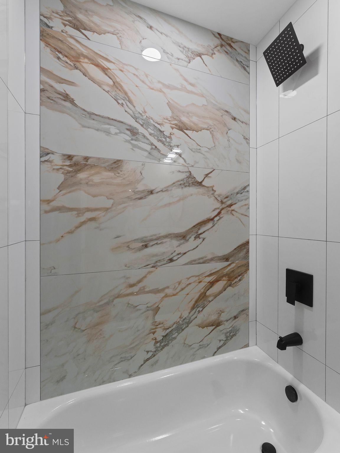 9314 Trout Road Philadelphia, PA 19115 - Photo 10 of 23 a bathroom with a bathtub
