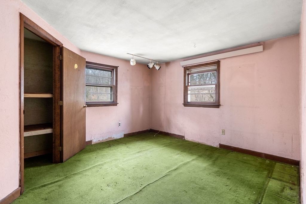 47 Riverside Drive North Reading, MA 01864 - Photo 12 of 34 a view of an empty room with a window