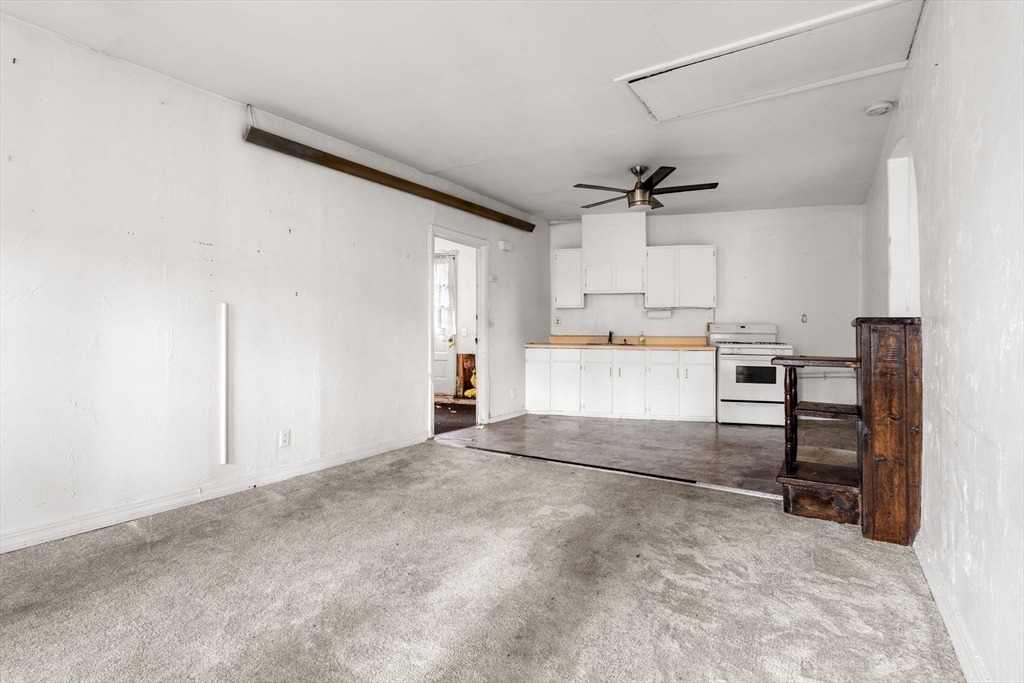 47 Riverside Drive North Reading, MA 01864 - Photo 16 of 34 a view of a kitchen with a sink and cabinets