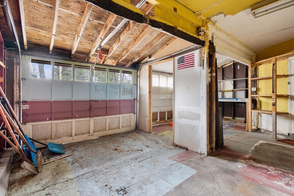 47 Riverside Drive North Reading, MA 01864 - Photo 18 of 34 a view of an empty room with wooden floor