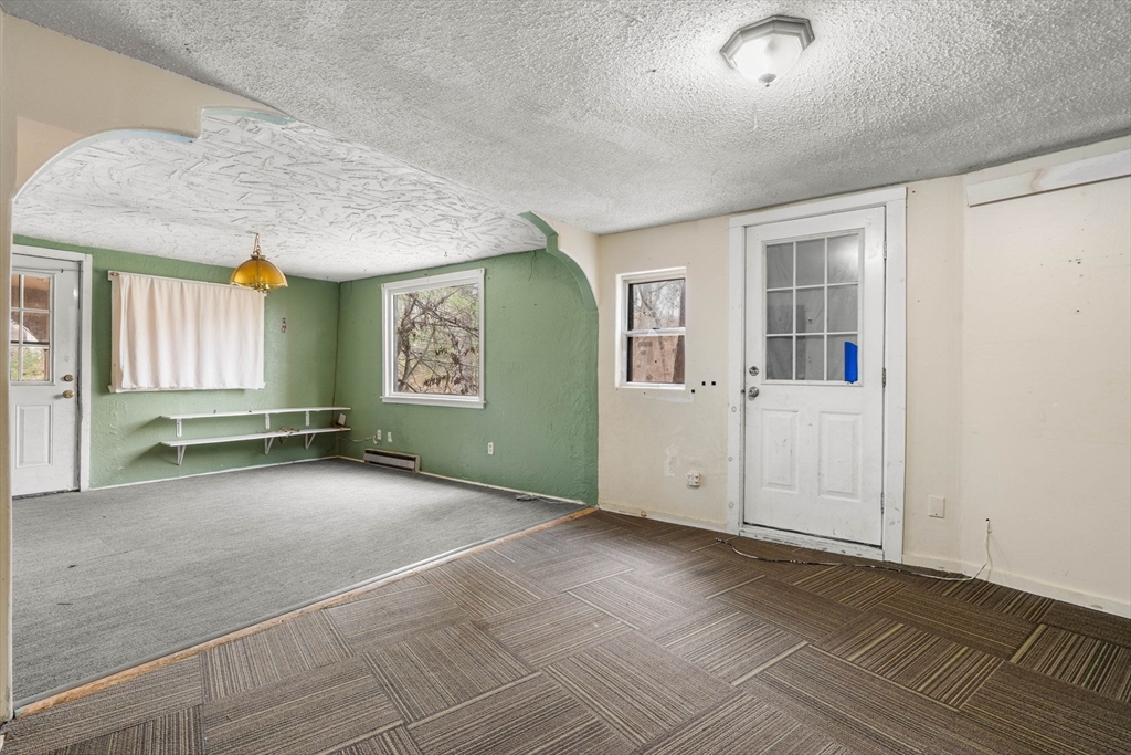 47 Riverside Drive North Reading, MA 01864 - Photo 20 of 34 an empty room with windows and closet