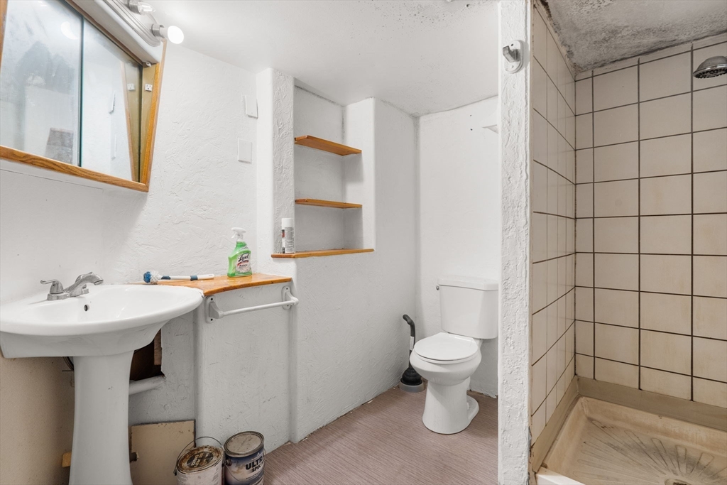 47 Riverside Drive North Reading, MA 01864 - Photo 24 of 34 a bathroom with a sink toilet and shower