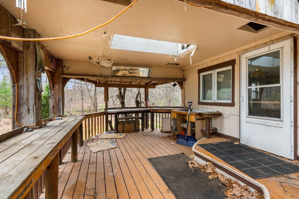 47 Riverside Drive North Reading, MA 01864 - Photo 26 of 34 a view of a balcony with chairs