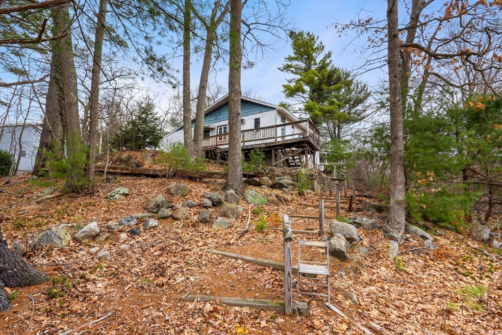 47 Riverside Drive North Reading, MA 01864 - Photo 31 of 34 a backyard of a house with lots of green space