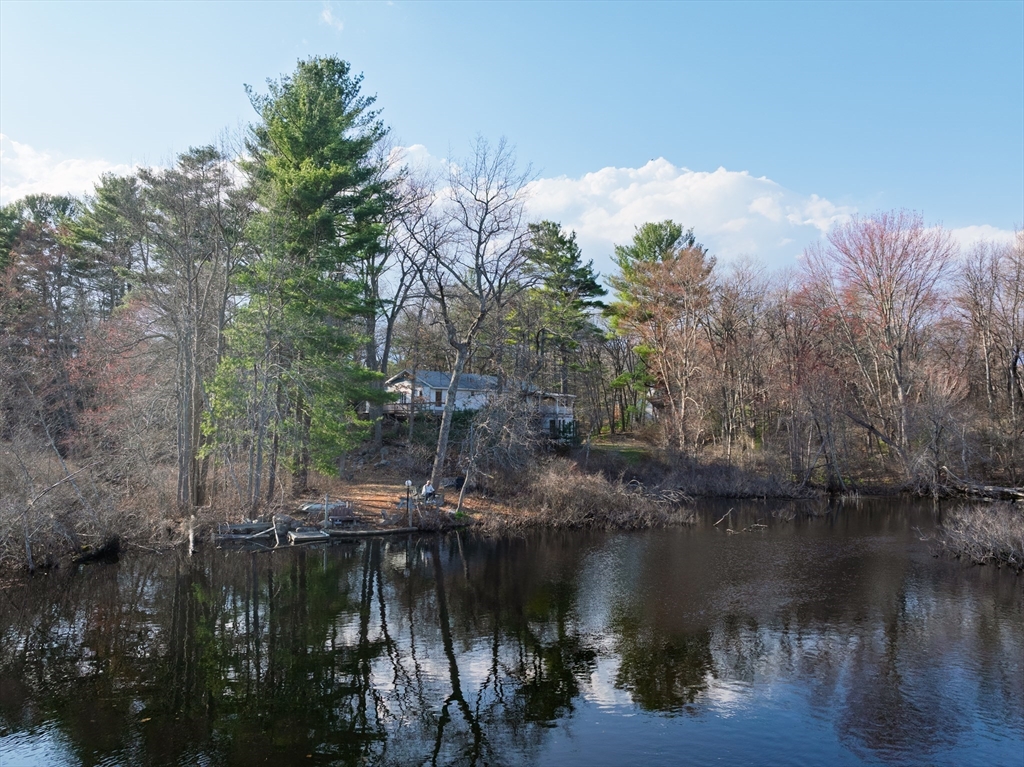47 Riverside Drive North Reading, MA 01864 - Photo 33 of 34 a view of a lake with lots of trees