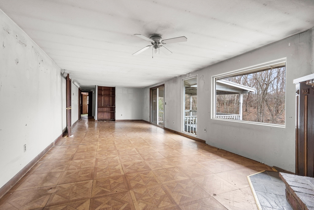 47 Riverside Drive North Reading, MA 01864 - Photo 8 of 34 a view of an empty room with a window