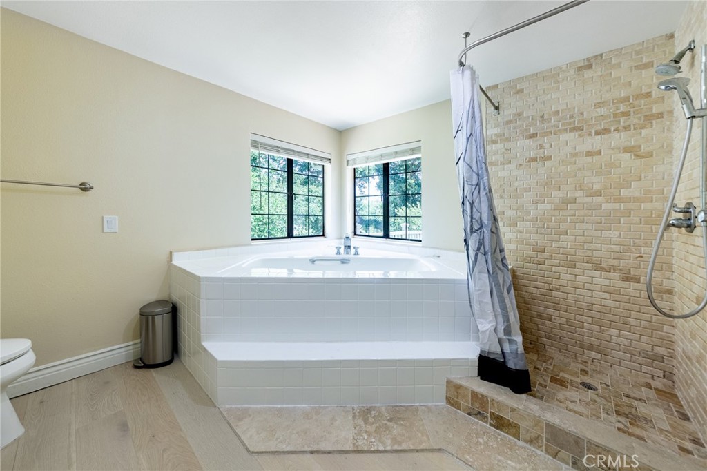 15601 Saddleback Road Canyon Country, CA 91387 - Photo 27 of 55 a spacious bathroom with a bathtub and shower