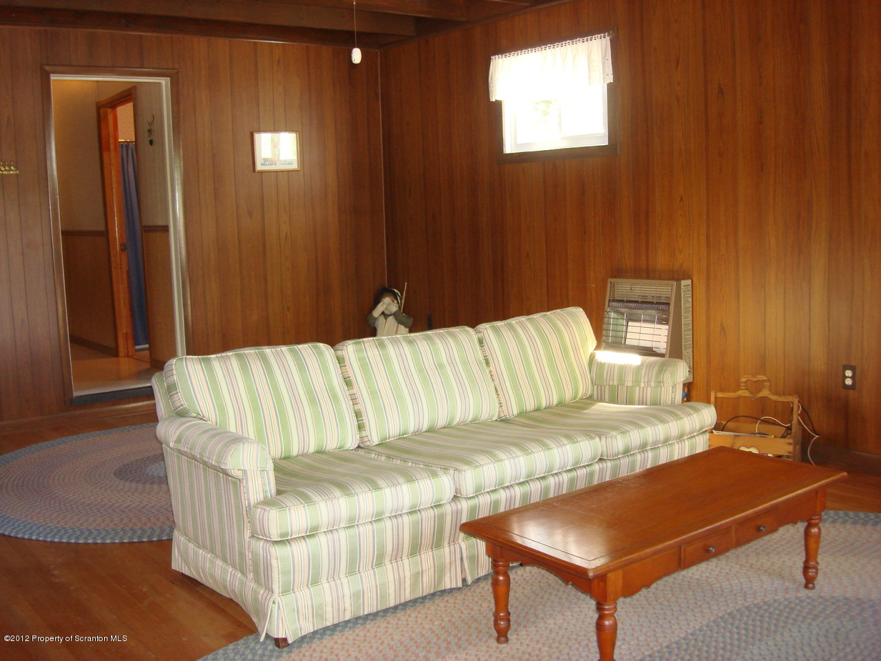 26 1/2 Indian Spring Road Tunkhannock, PA 18657 - Photo 4 of 11 a bedroom with a bed and window