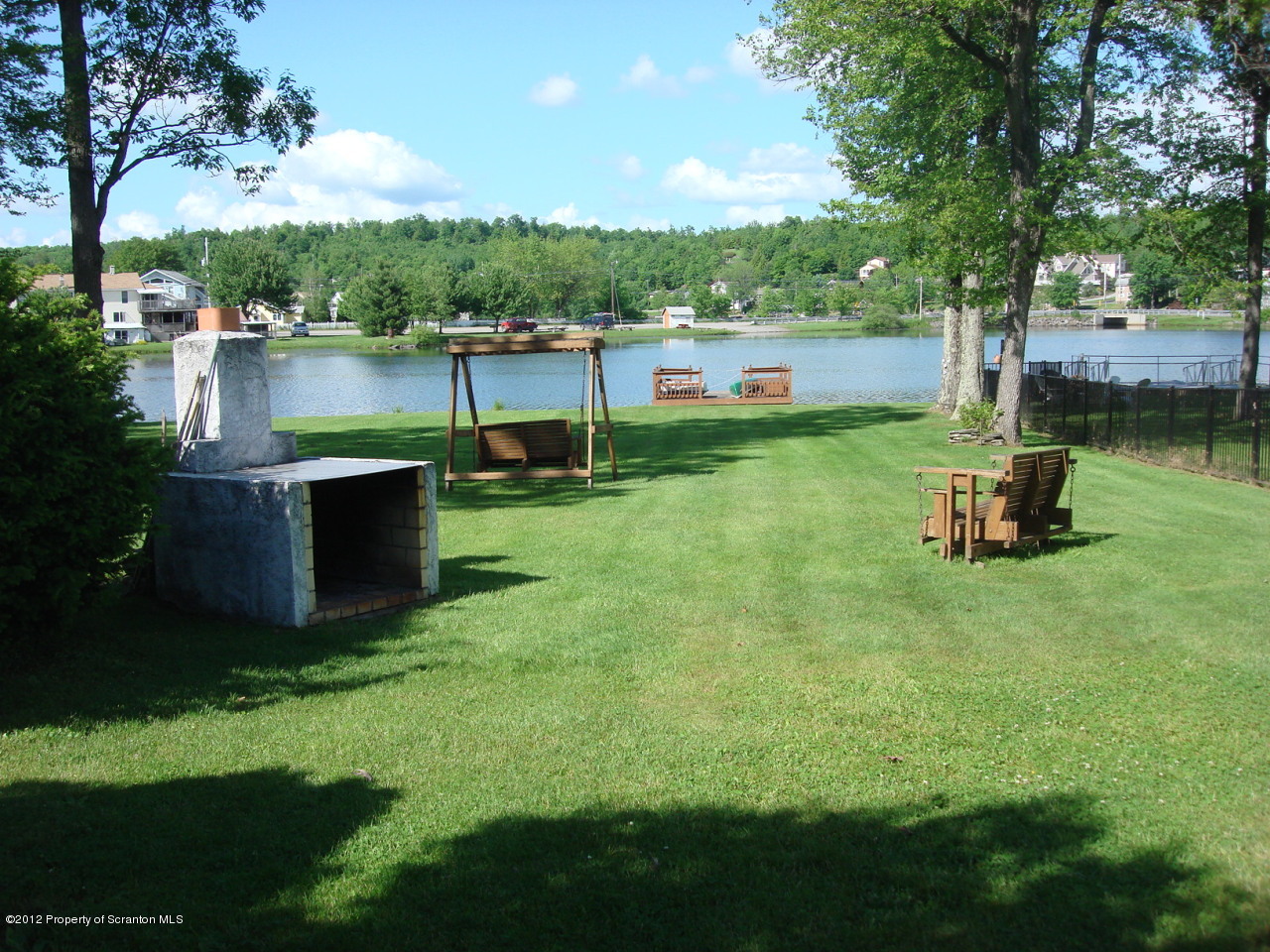 26 1/2 Indian Spring Road Tunkhannock, PA 18657 - Photo 8 of 11 a view of a backyard with a lake view