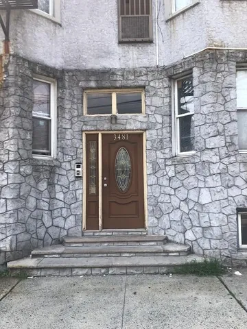 a front view of a house with a door