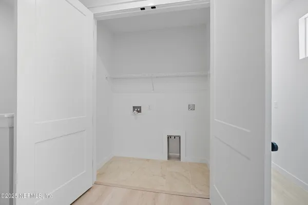 a view of an outdoor space with garden and seating area