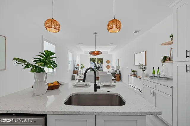 a view of bathroom with a potted plant