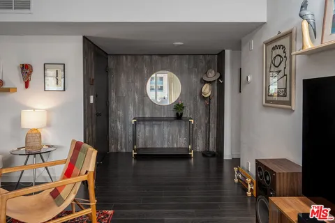 a view of dining room with furniture and wooden floor