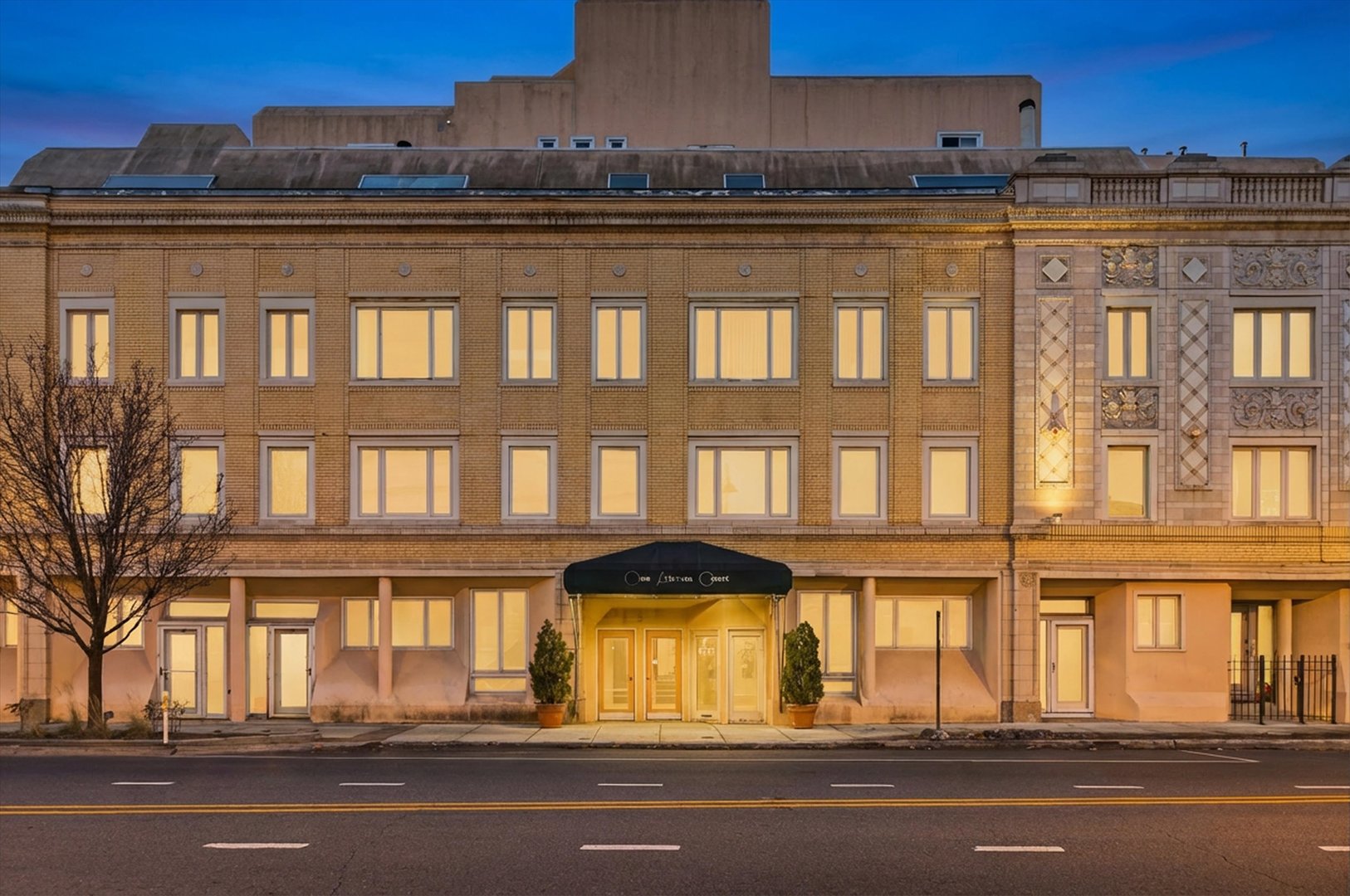 a view of a building on a street