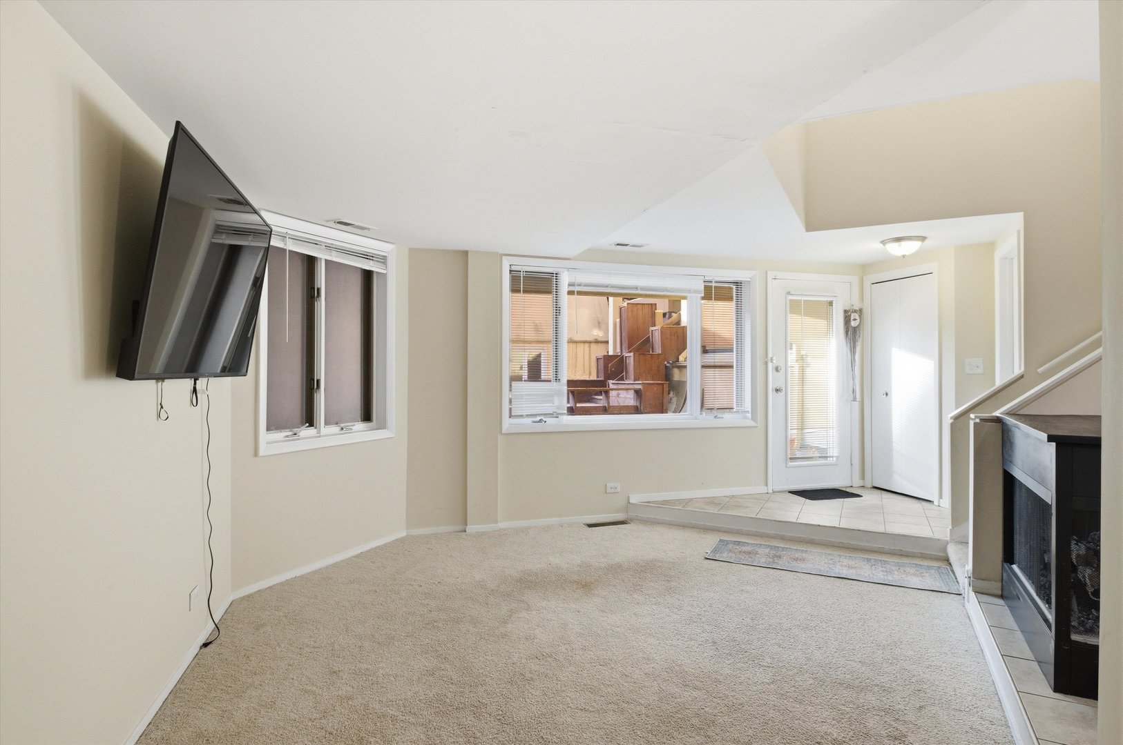 6337 Roosevelt Road, Unit 114 Berwyn, IL 60402 - Photo 24 of 33 a view of livingroom with hardwood floor and flat screen tv