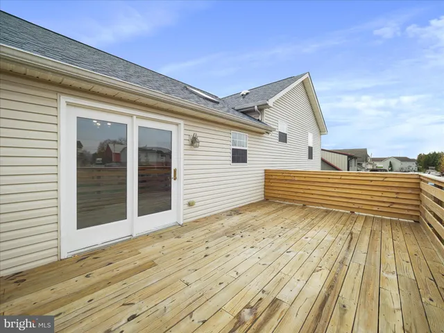 a view of a house with a roof deck