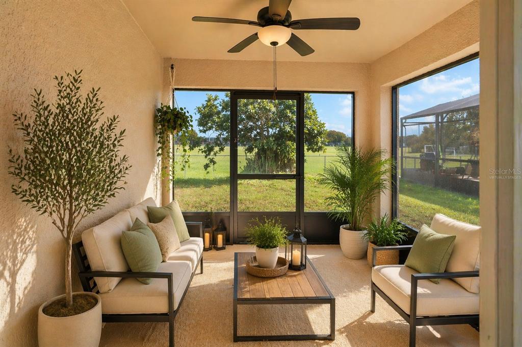 2327 Andrews Valley Drive Kissimmee, FL 34758 - Photo 16 of 42 a living room with furniture and a large window