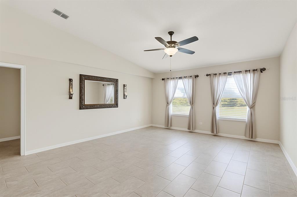 2327 Andrews Valley Drive Kissimmee, FL 34758 - Photo 22 of 42 a view of an empty room with a window