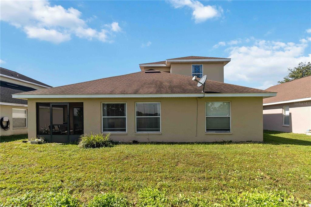 2327 Andrews Valley Drive Kissimmee, FL 34758 - Photo 35 of 42 a front view of house with yard