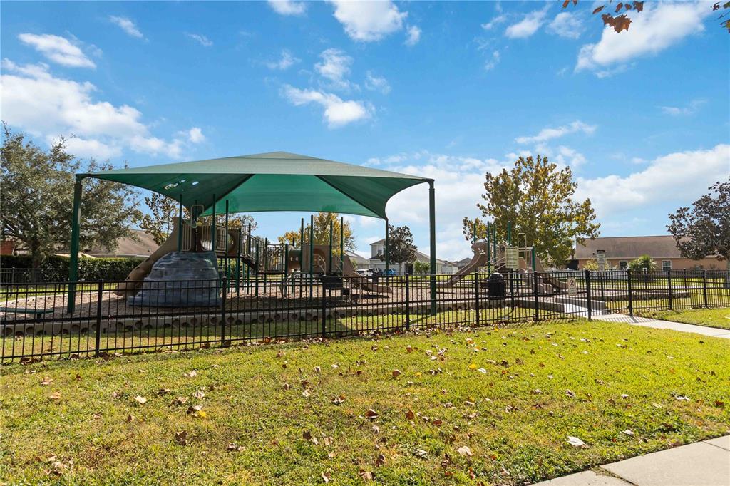 2327 Andrews Valley Drive Kissimmee, FL 34758 - Photo 42 of 42 a view of a swimming pool with an outdoor seating