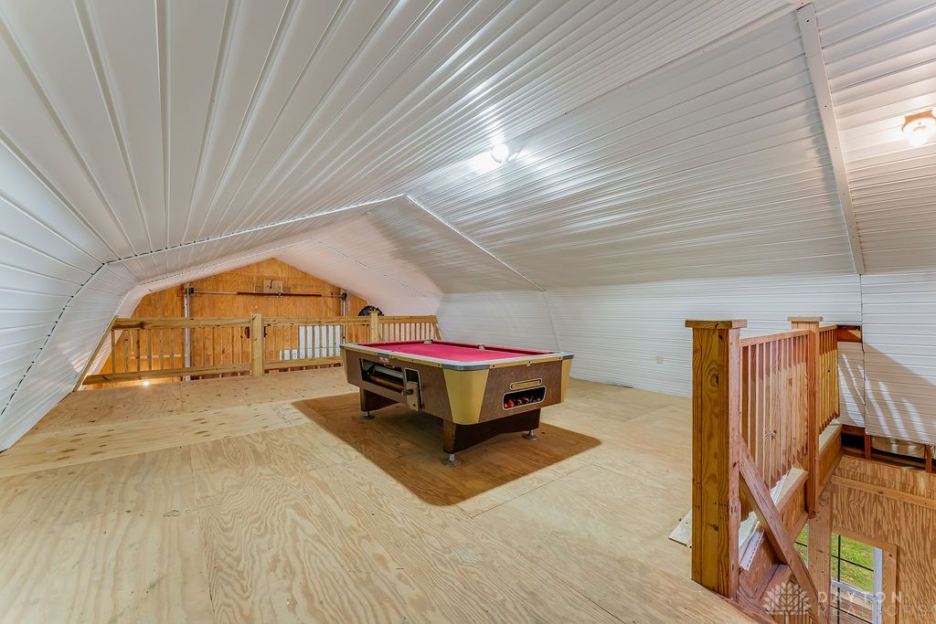 7400 Cook-Jones Road Waynesville, OH 45068 - Photo 65 of 72 This spacious loft area offers versatile use with durable wood flooring and ample natural light.