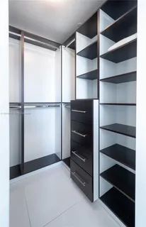 a view of an empty walk in closet