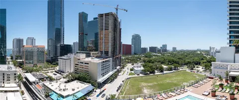 a view of a city with tall buildings