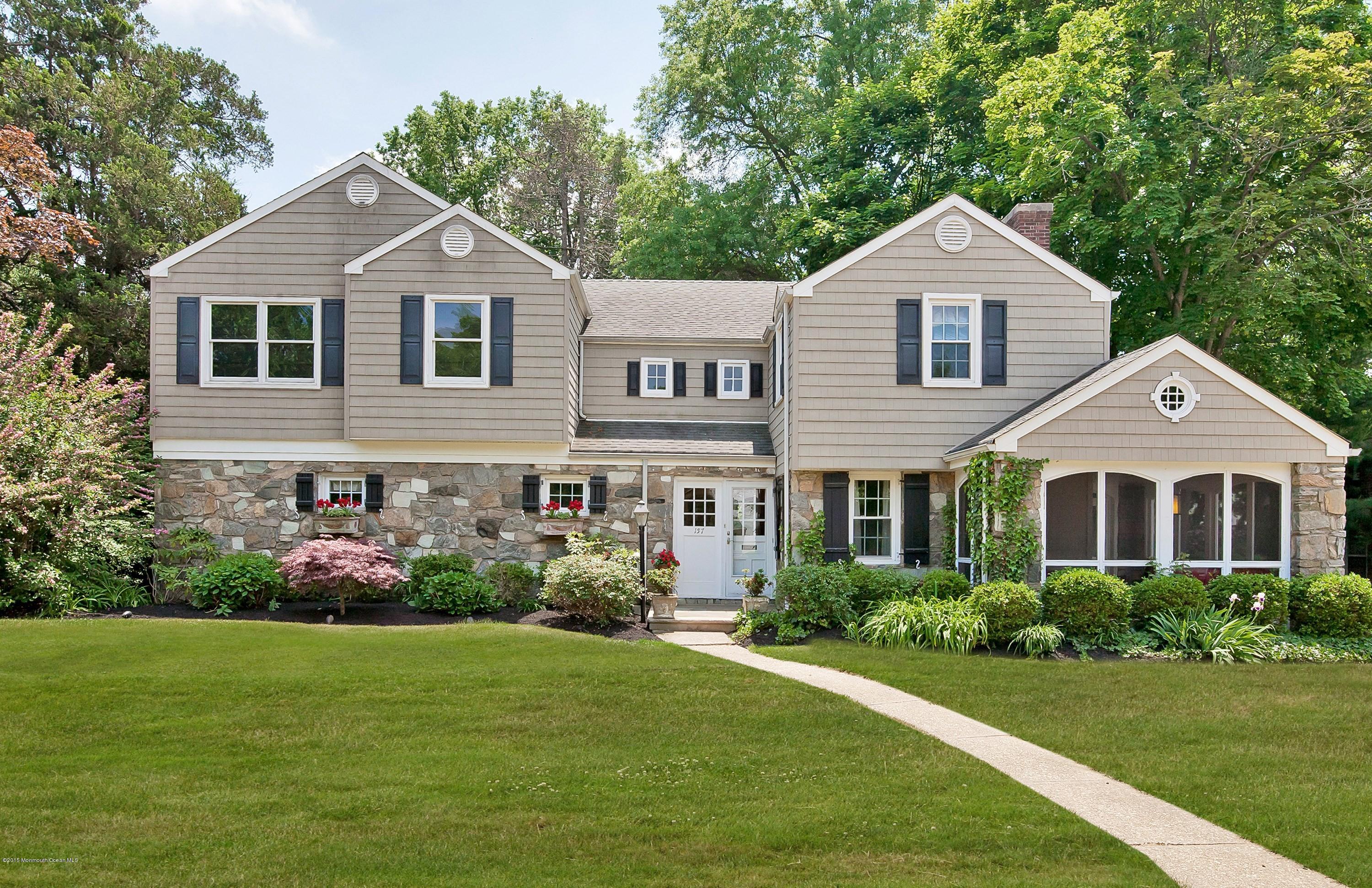 157 Harding Road Red Bank, NJ 07701 - Photo 1 of 37 a front view of a house with garden