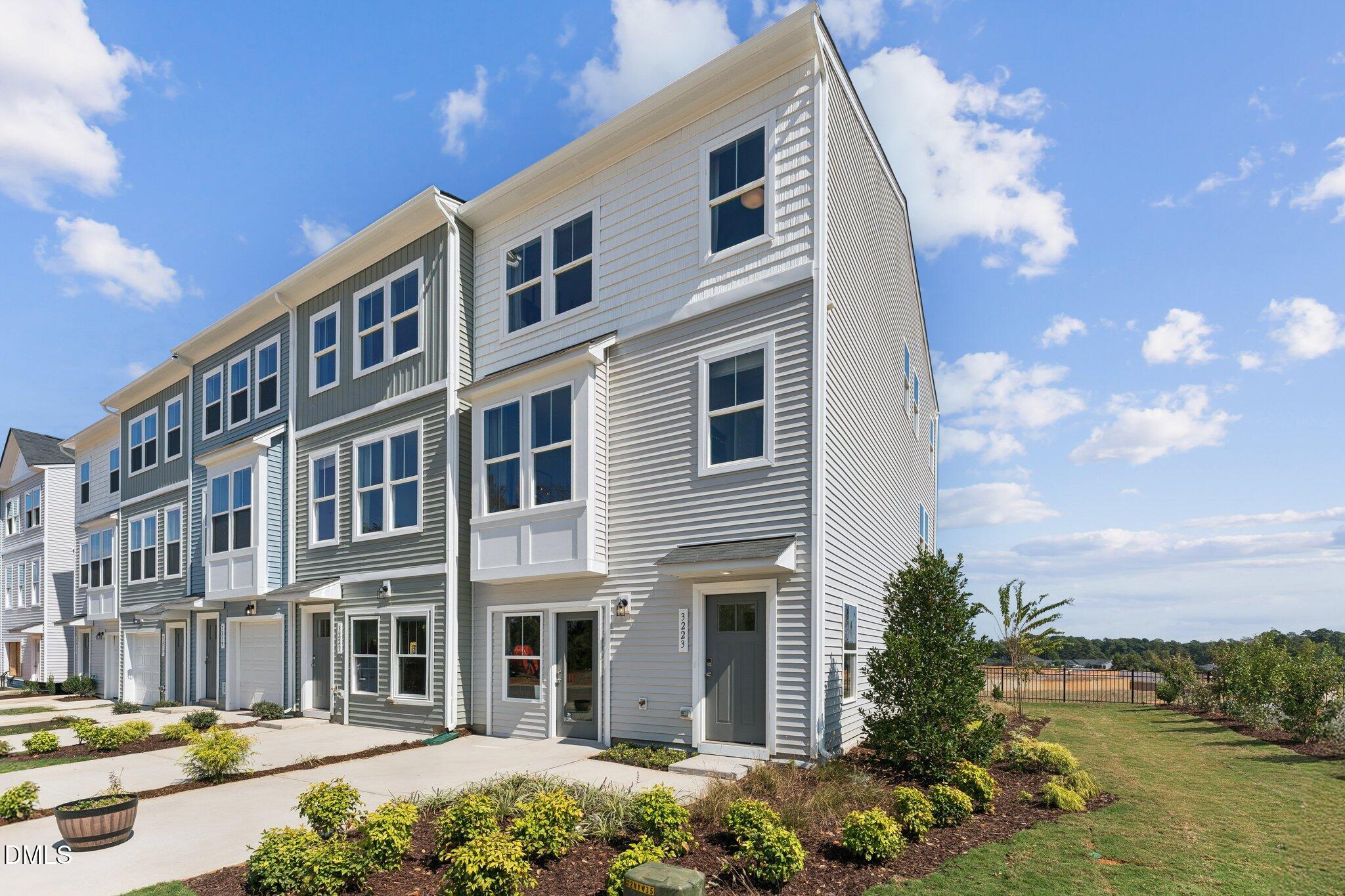 3100 Bomore Road Raleigh, NC 27610 - Photo 2 of 36 a front view of a building with balcony