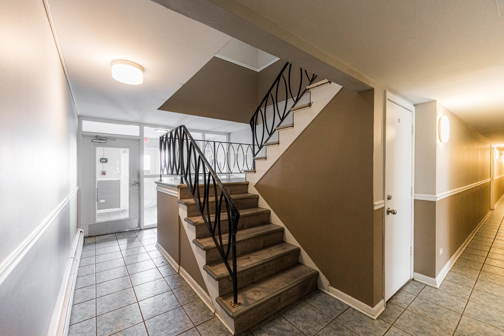 680 Marilyn Avenue, Unit 6206 Glendale Heights, IL 60139 - Photo 3 of 18 a view of entryway and hall with wooden floor
