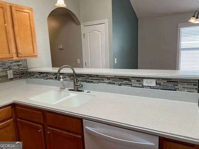 a close view of a sink and a mirror