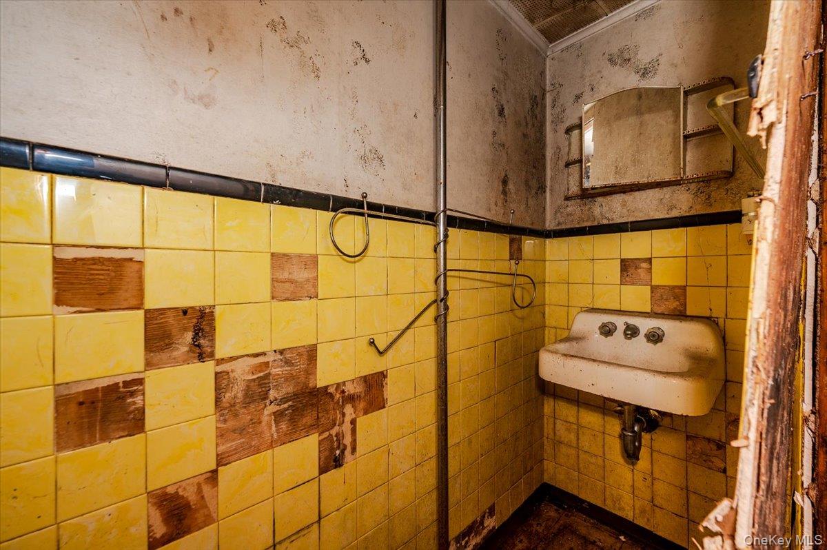 10 Hampton Terrace White Plains, NY 10607 - Photo 19 of 30 a bathroom with a sink and shower