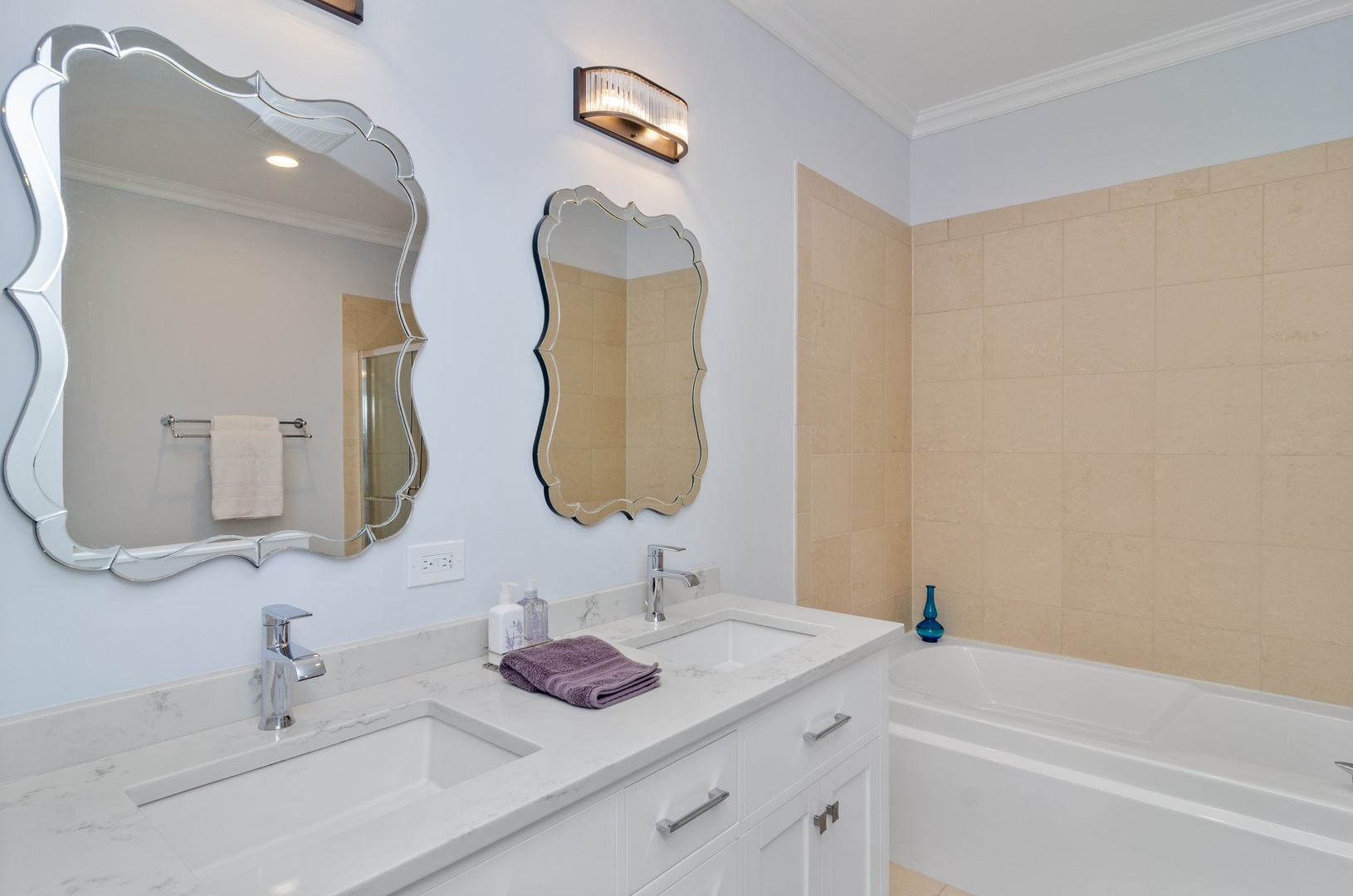 1038 South Racine Avenue, Unit 302 Chicago, IL 60607 - Photo 14 of 19 a bathroom with a double vanity sink and a mirror