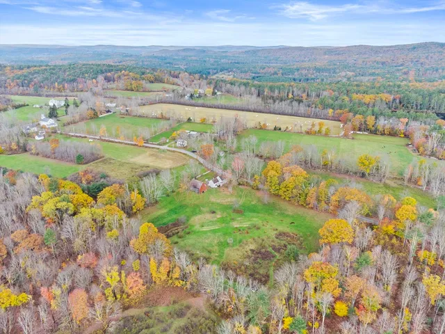 a view of a city with an ocean view
