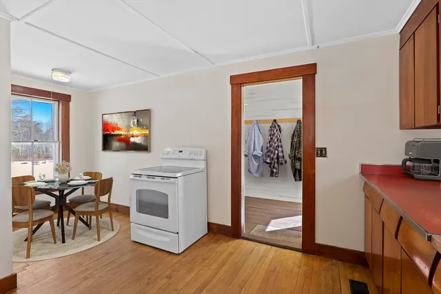 a view of a livingroom with furniture and a flat screen tv