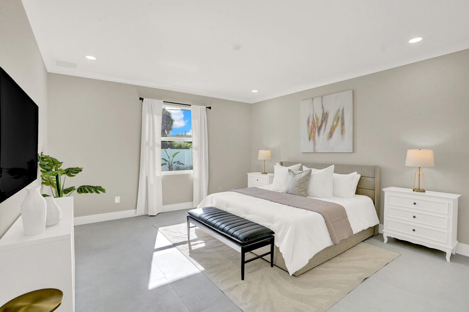 18 Southwest 6th Street Delray Beach, FL 33444 - Photo 17 of 40 a bedroom with a bed and a couch