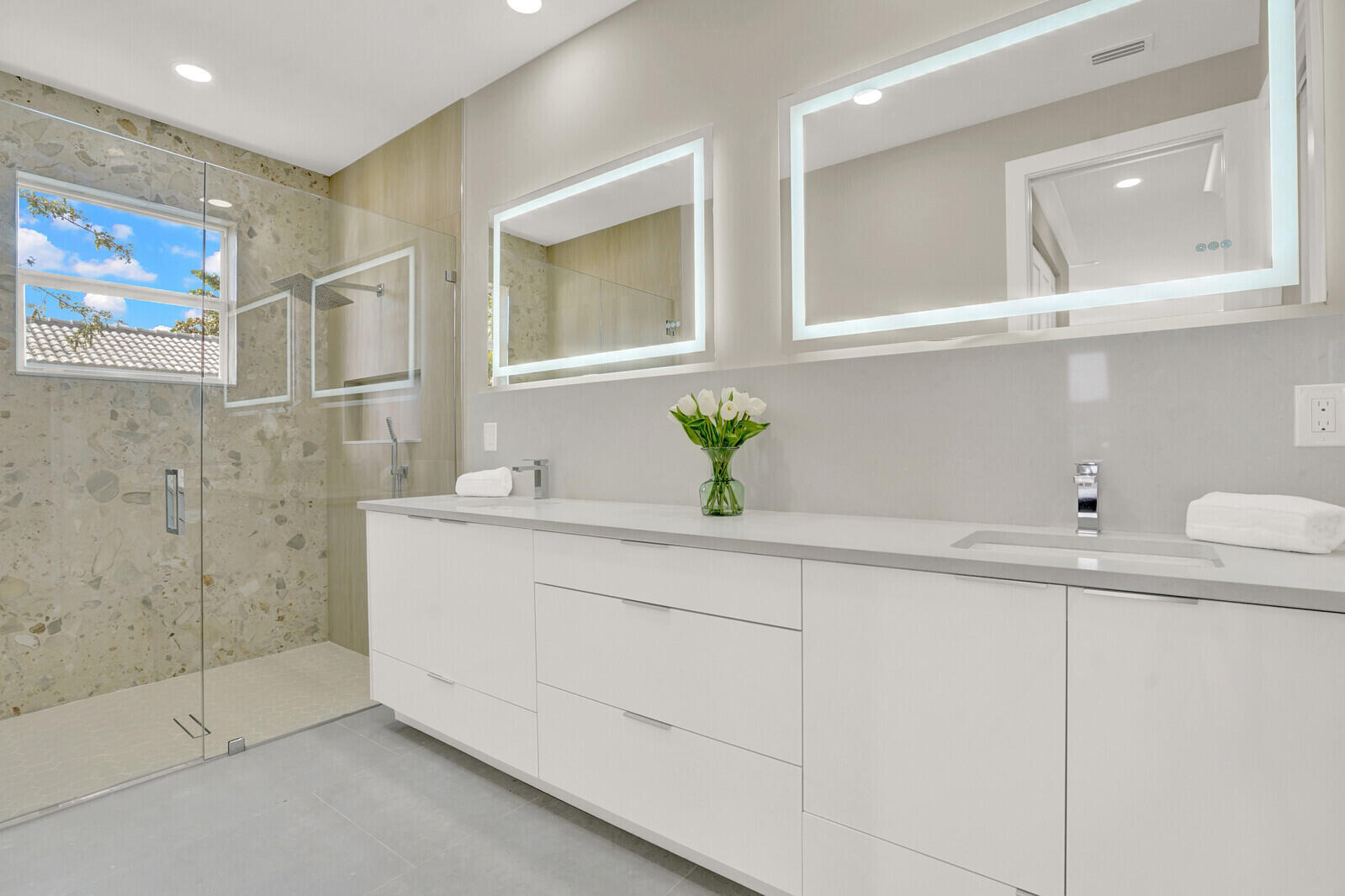 18 Southwest 6th Street Delray Beach, FL 33444 - Photo 19 of 40 a bathroom with a sink and mirror