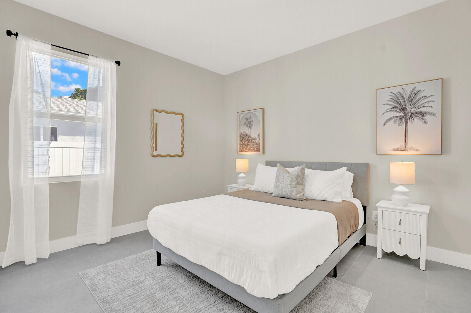 18 Southwest 6th Street Delray Beach, FL 33444 - Photo 20 of 40 a bedroom with a bed and a window