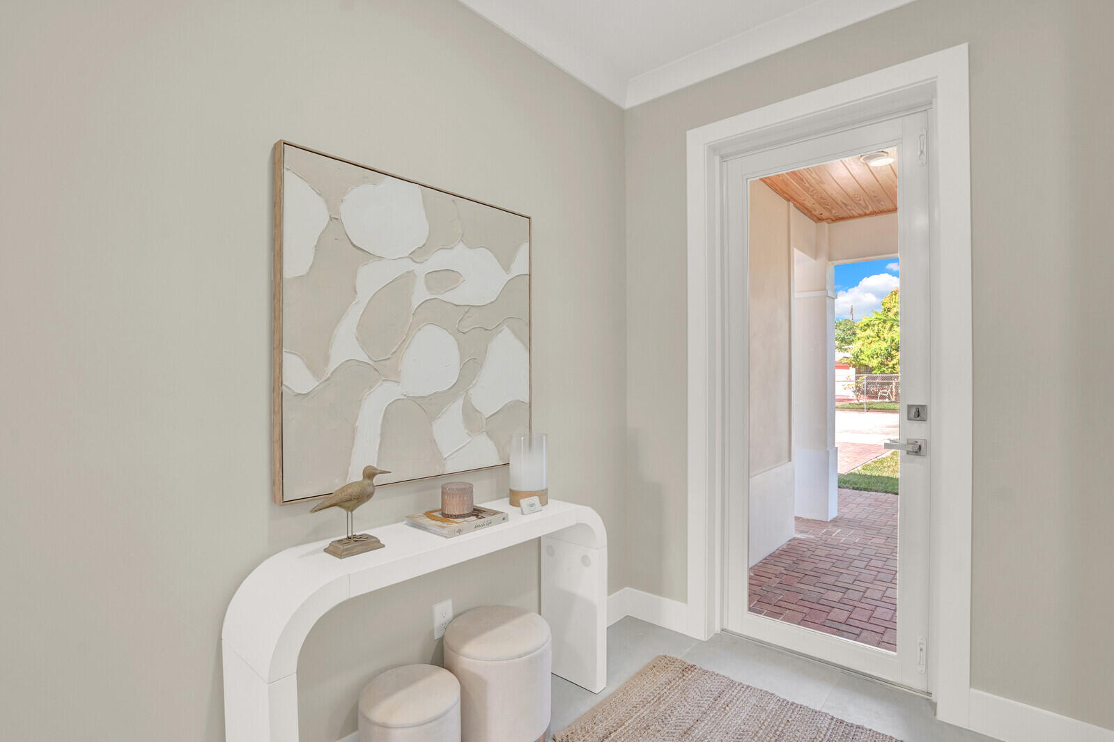18 Southwest 6th Street Delray Beach, FL 33444 - Photo 5 of 40 a bathroom with a granite countertop sink and a mirror